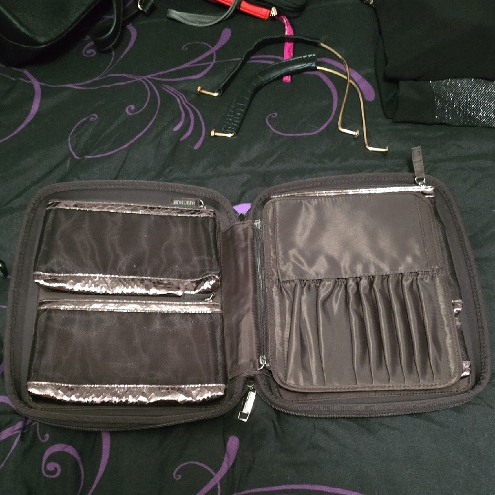 Laura Mercier makeup bag.